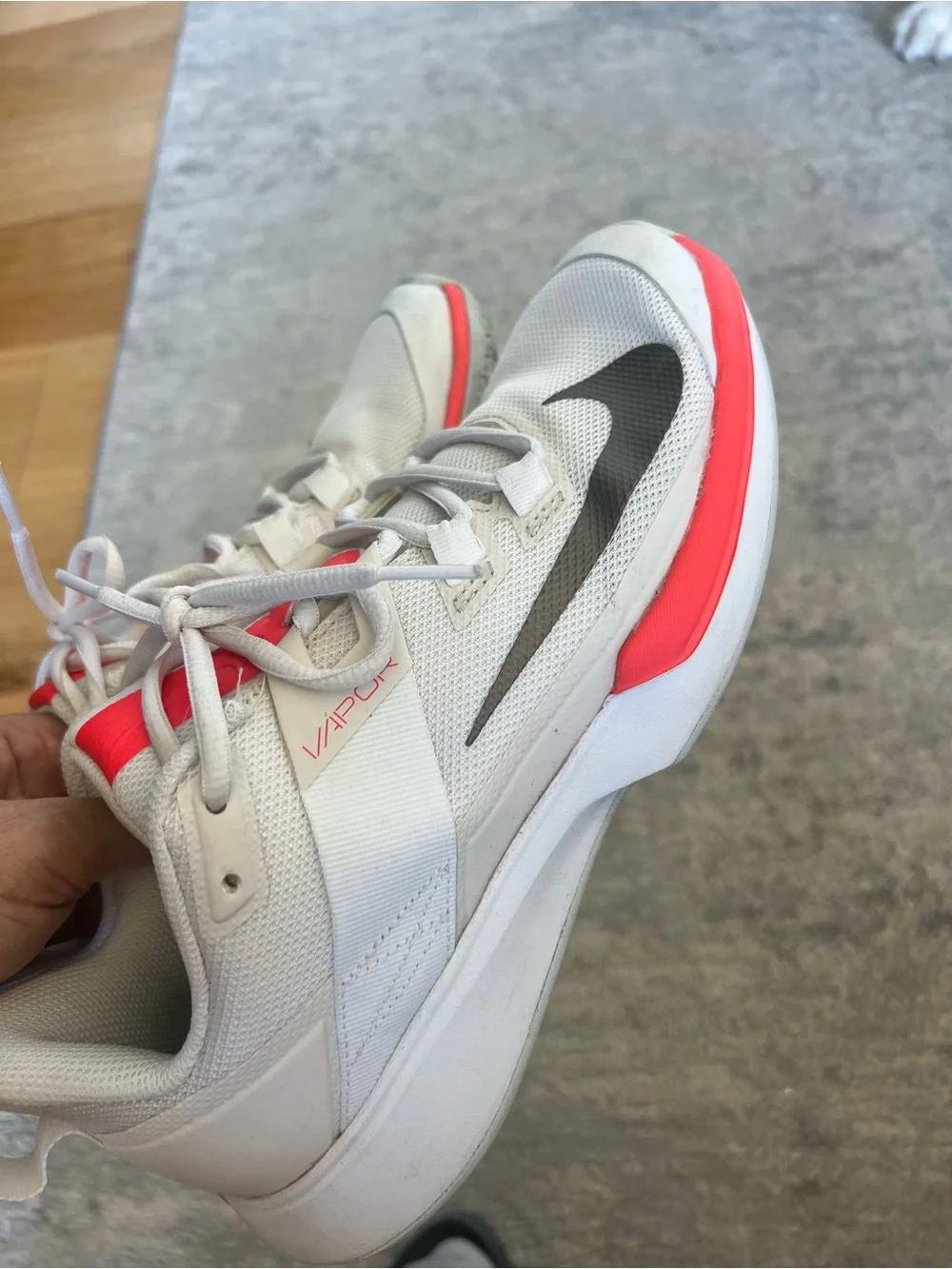 Nike White tennis Sneakers with neon Accents and Black Swoosh